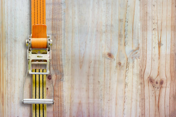 istock ratchet strap on wood background 1433514998
