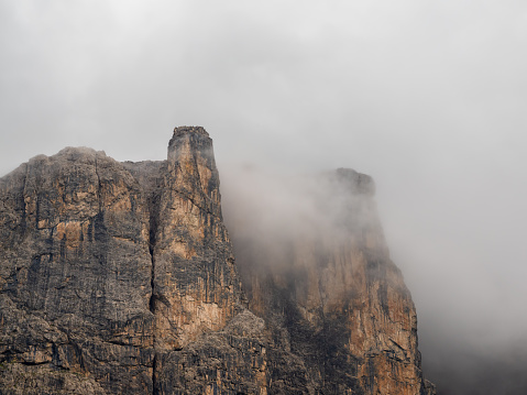 A dramatic cloudy scene in Dolomite mountains in Corvara, Alta Badia, Italy