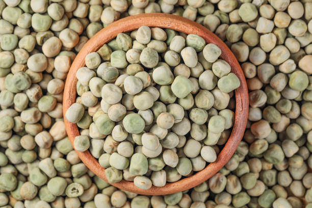 istock Green Pea (Green Matar,  Sweet peas). Garden peas in Pottery 1433517665