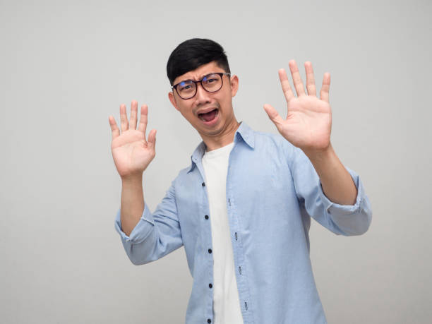 istock Young man wear glasses gesture shocked isolated 1433517711