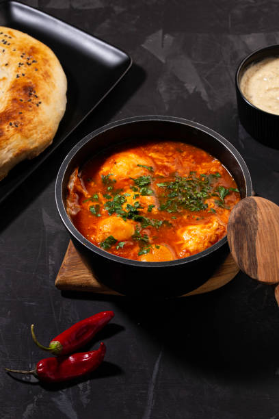 istock shakshouka on a dark background 1433525011