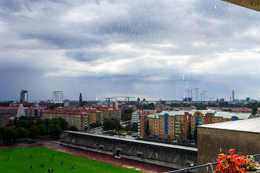 Malmo, Sweden - May 29, 2021: Rainy day with dramatic clouds in Malmo city, Sweden