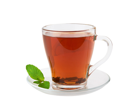 Black tea with lemon isolated on white background