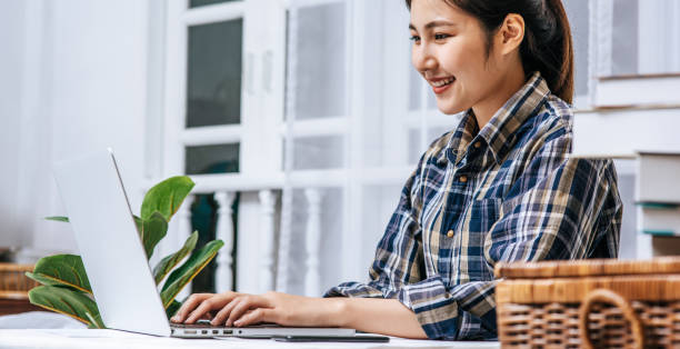istock Women use laptops in the office with pleasure 1433539750