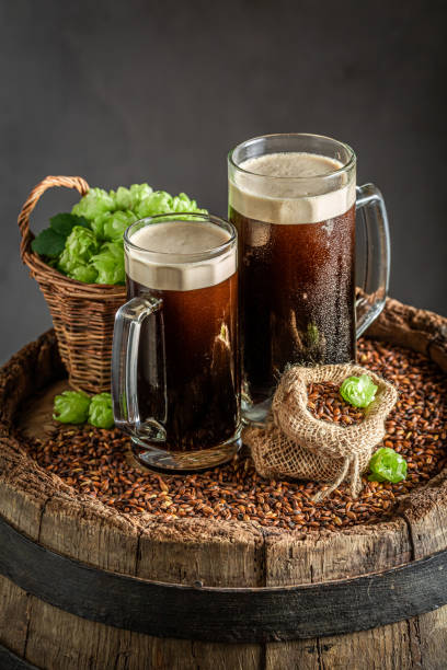 istock Fresh and cold dark beer in pint grass 1433548023