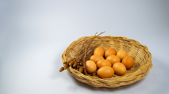 Several chicken eggs in a wooden tray, Fresh product, Concept Eggs Fresh from farm, Copy space.