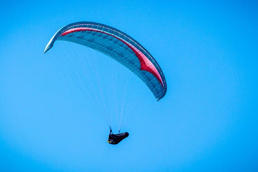 Monte San Vicino, Italy - November 1, 2020: Paragliding in the mountains, Marche, Italy.