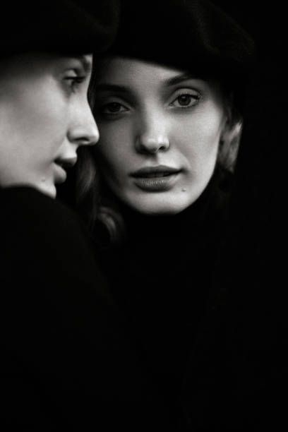 Beautiful woman and her reflection