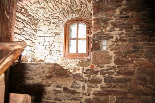 The interior of an old room of a brick house