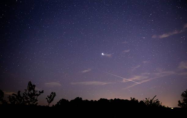 istock Starry sky with a shooting star at night 1433560104