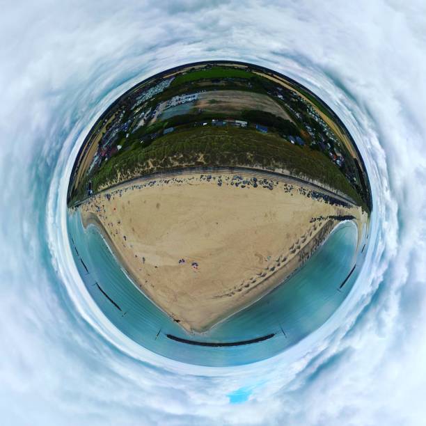 istock Spherical panorama of a sandy beach with coastline forest under the cloudy sky 1433561422