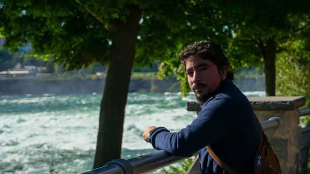 istock Hispanic male chilling in a park on a sunny day 1433562261
