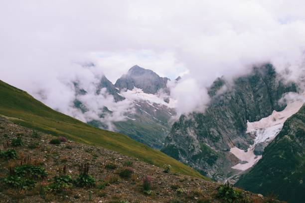 istock Beautiful view of mountains with clouds over them. 1433562784