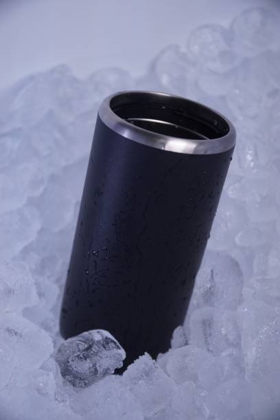 istock Vertical shot of a black thermo cup surrounded by ice cubes 1433564605