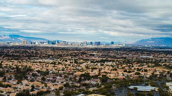 An aerial view of the skyline of Las Vegas with the NV strip in the distance