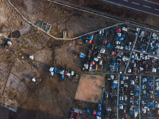 istock Road going through a countryside town, aerial, top view 1433571870