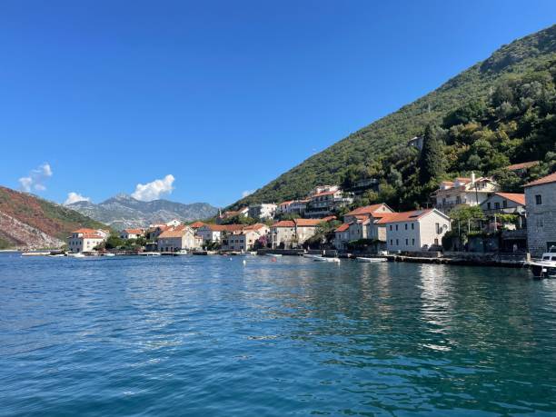 istock Village near the ocean with a cloudy blue sky 1433571929