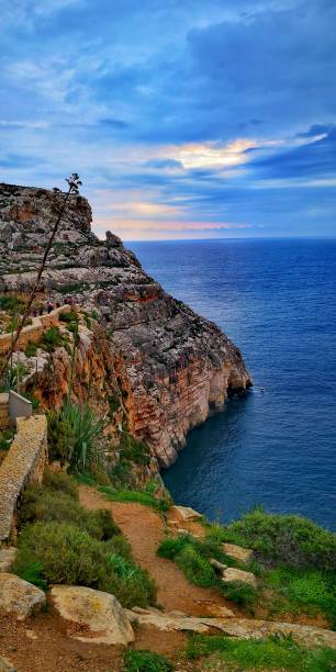 istock Vertical shot of rocky cliffs along Malta coast 1433573322
