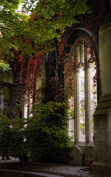 istock Vertical shot of the St Dunstan churchyard with decorative greenery 1433574174