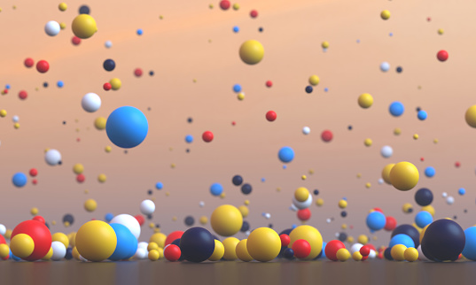 Multi colored spheres falling from the sky