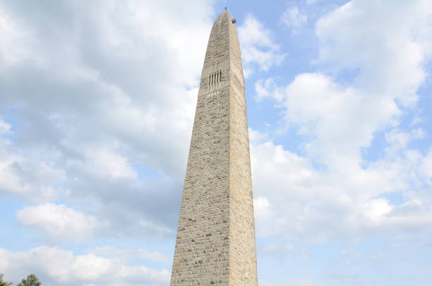 istock tall stone building or tower with clouds in sky 1433582901