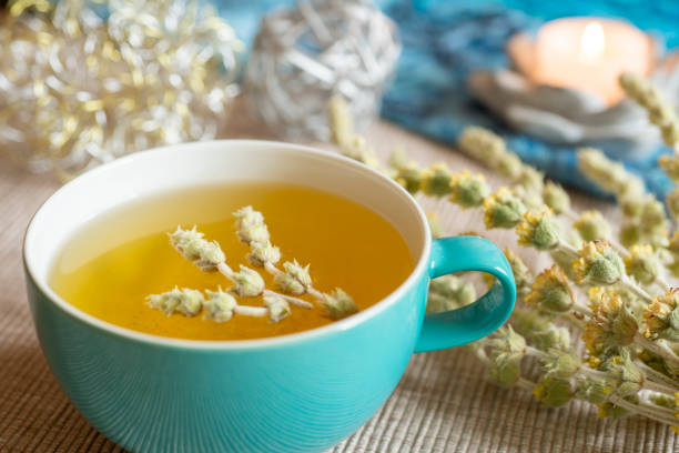 istock Tea in a turquoise cup with decoration - Greek mountain tea, herbal tea, white tea 1433584106