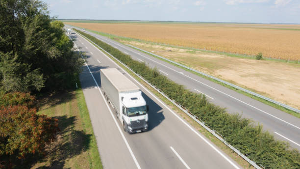 istock A white truck is moving on the highway 1433586763