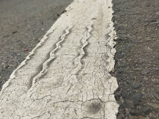 istock White line texture details asphalt close up 1433595419