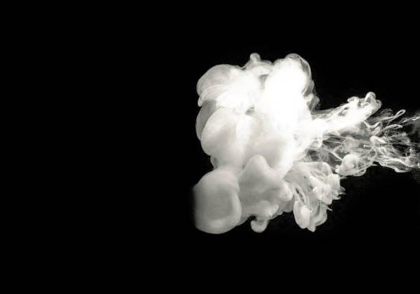 istock Beautiful white abstract steam from tea or coffee on a black isolated background 1433595779