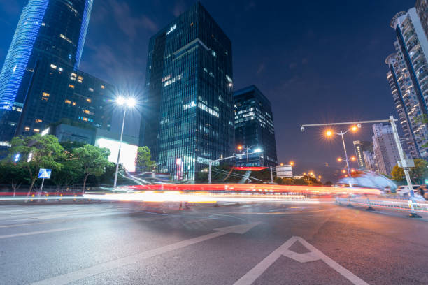 istock the light trails on the modern building background in shanghai china 1433606368