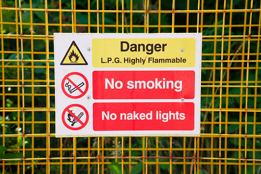 Highly flammable gas propane cylinders store cage for safety near construction building site and the public protection from explosion UK