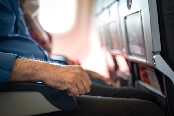 istock A passenger during sitting at the economy class seat. 1433609984