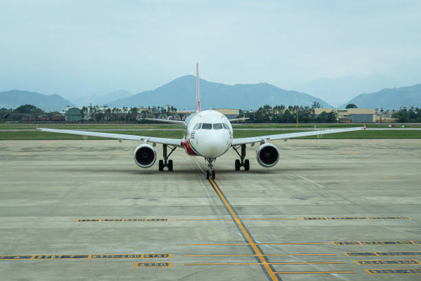 istock An airplane is arrival on airport runway. 1433610001