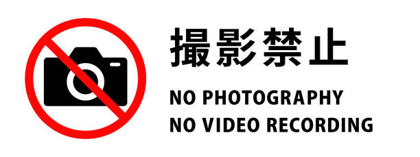 Simple no photography sign (Japanese and English) Simple no photography sign (Japanese and English) no photographs sign illustrations stock illustrations