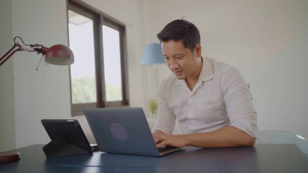 istock Asian man working at home. 1433616069