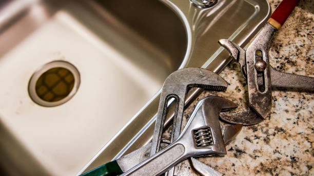istock New kitchen sink with pipe wrench key on top 1433617432