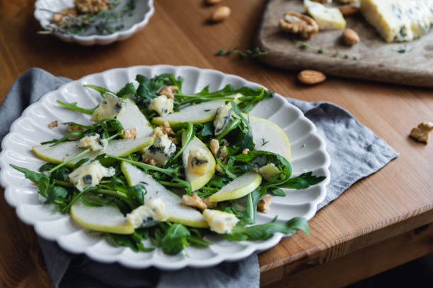 istock Healthy salad with pears, arugula, walnut and blue cheese. 1433622244