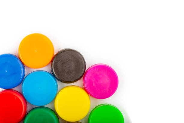 istock olorful plastic caps on white background, recycle for environment concept. Separate waste sorting. Space for text. 1433624331
