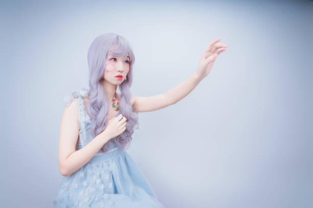 Portrait of pretty mystic lady in gothic white dress in underground dungeon
