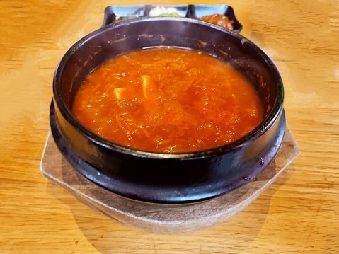 Hot korean food on table at restaurant in glasgow scotland england uk
