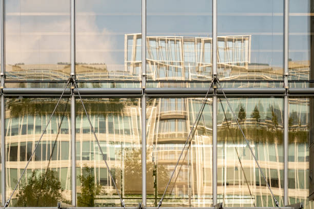 Street scene reflected in the glass curtain wall