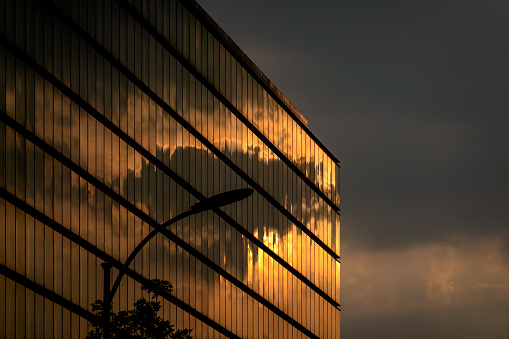 Facades of modern buildings under sunshine glow