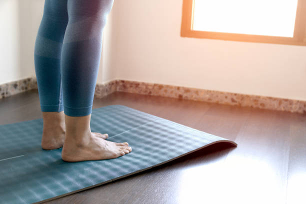 istock Feet straight on the mat facing the window 1433633351
