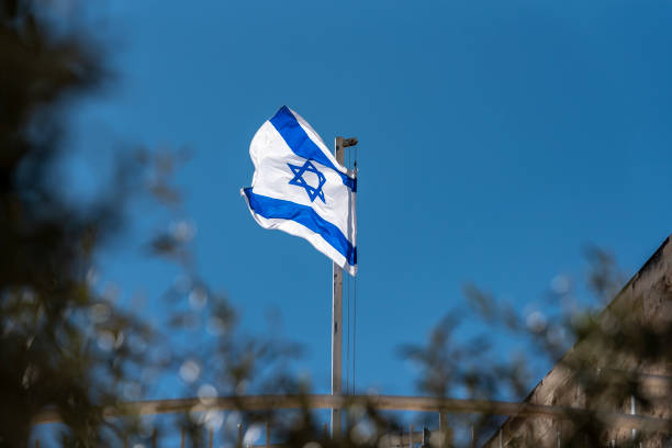 istock Large Israel flag waving in the wind 1433633683