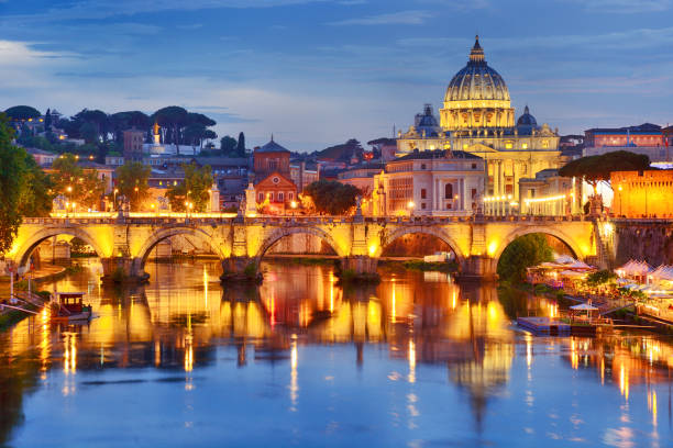 St. Peter's Basilica, Vatican St. Peter's Basilica in Vatican and Tiber river in Rome at sunset vatican stock pictures, royalty-free photos & images