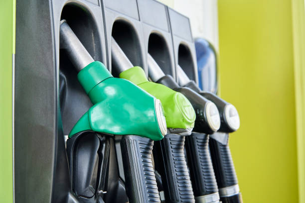 istock gasoline pump nozzles on petrol station 1433639909