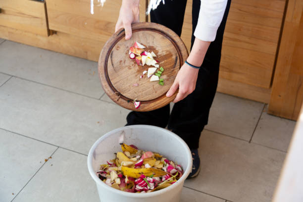 istock Compost bin in kitchen is getting filled with temains of cooking 1433641462