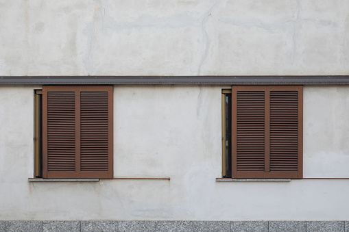 Facade with many wooden shutters in old part of Duesseldorf