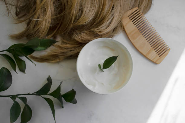 istock Hair mask, comb on a light background 1433657533