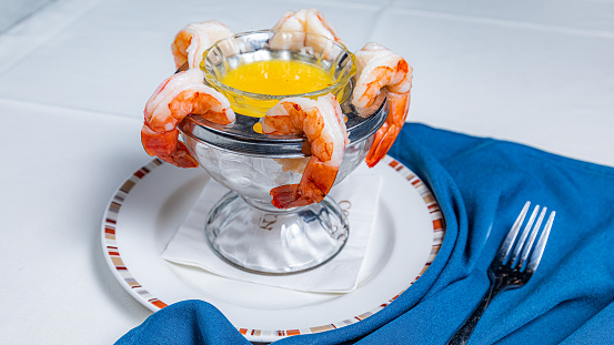 Shrimp cocktail on a marble table